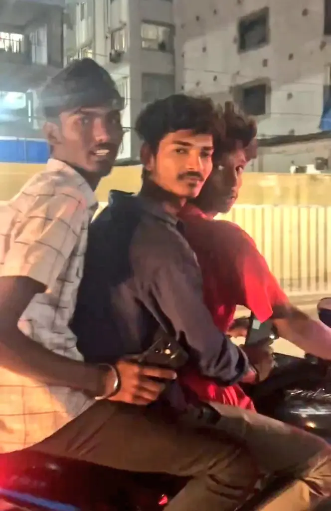 3 Men on Bike Harass Girls on Scooty with Peacock Feather