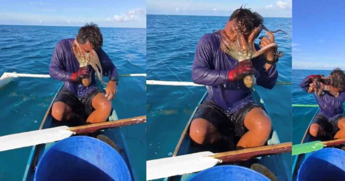 philippines-fisherman-battles-octopus-clinging-to-his-face-in-bizarre-video